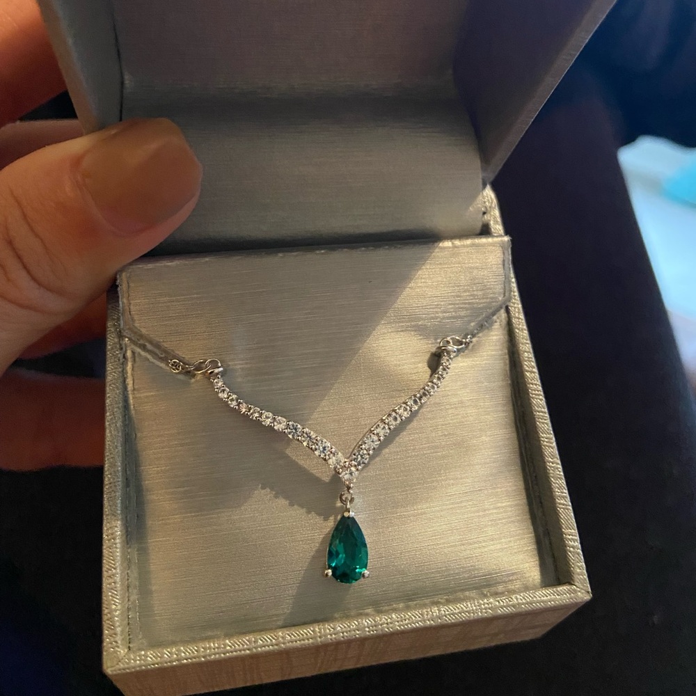 Pear shaped emerald and white sapphire necklace from Zales